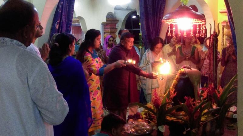 Why do we perform Aarti